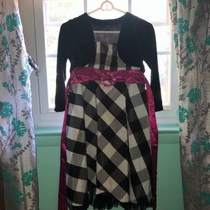 ruffled plaid dress; fleece sweater ((used))